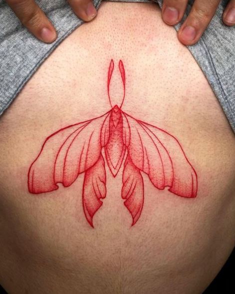Big Red Butterfly Ribs Tattoo