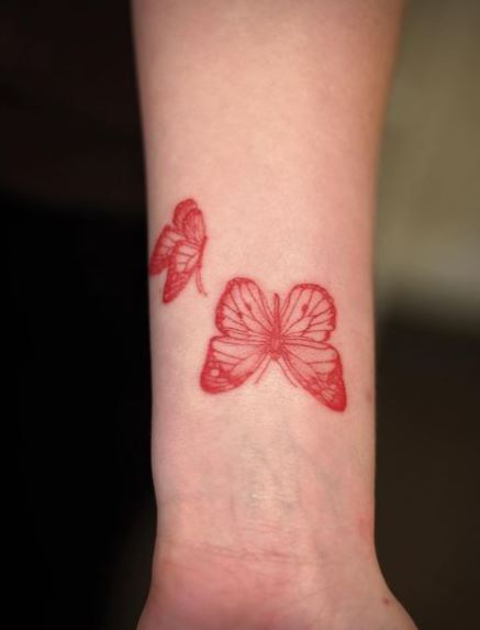 Red Monarch Butterflies Wrist Tattoo