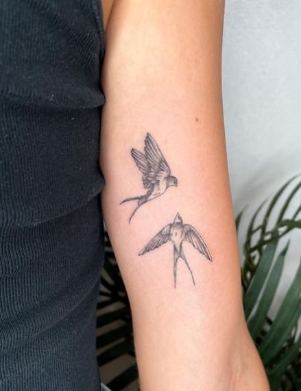 Grey Mini Two Flying Swallows Biceps Tattoo