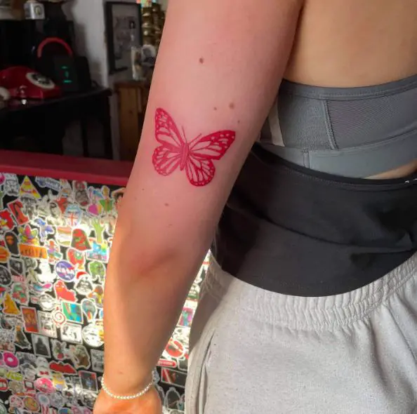 Red Ink Butterfly Elbow Tattoo