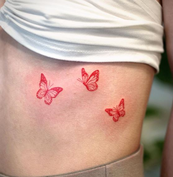 Red Monarch Butterflies Ribs Tattoo