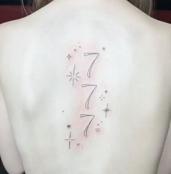 Stars and Angel Number 777 Spine Tattoo