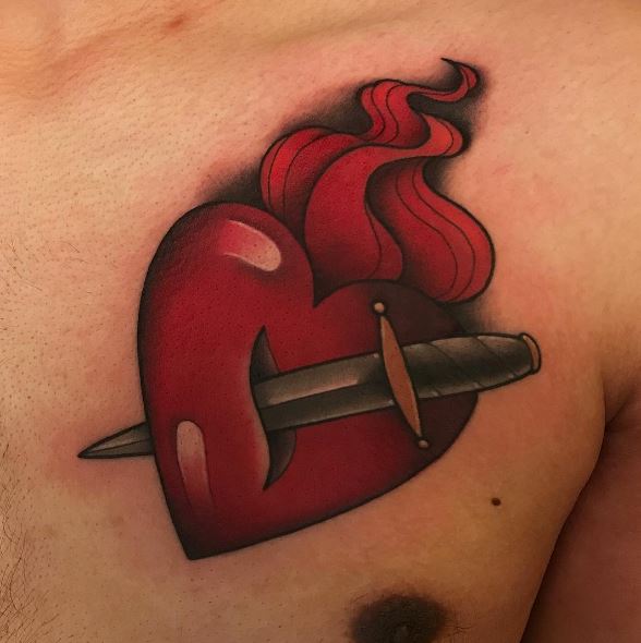 Knife Stabbed in Red Sacred Heart Chest Tattoo