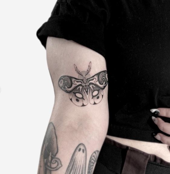 Black and Grey Moth with Spread Wings Arm Tattoo