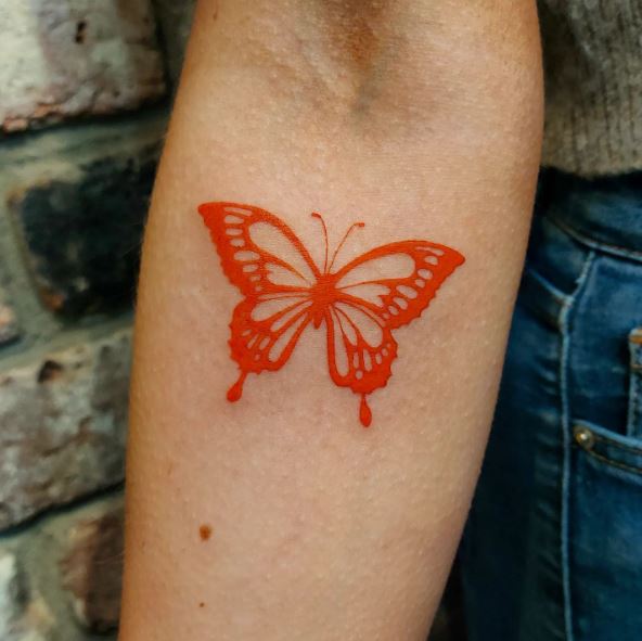 Light Red Butterfly Forearm Tattoo