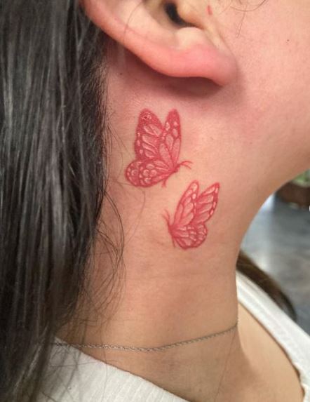 Two Red Monarch Butterflies Neck Tattoo