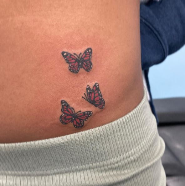 Black and Red Butterfly Belly Tattoo