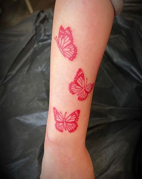 Red Monarch Butterflies Forearm Tattoo