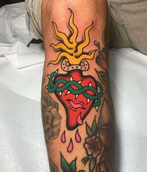 Colorful Bleeding Sacred Heart Leg Tattoo