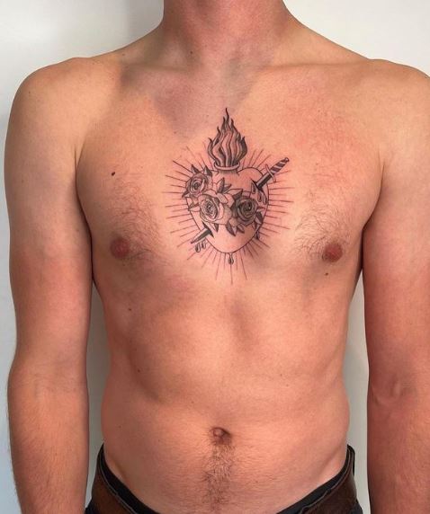 Flowers on Stabbed Sacred Heart Chest Tattoo