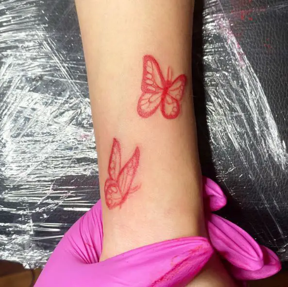 Couple of Red Monarch Butterflies Forearm Tattoo