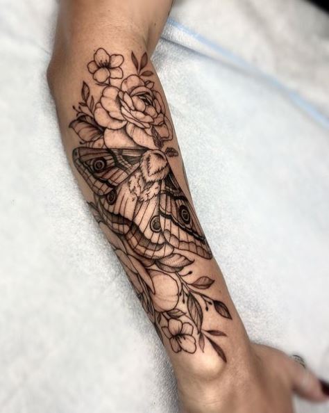 Black and Grey Flowers and Moth Forearm Tattoo