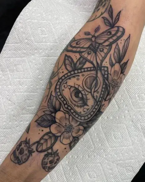 Grey Flowers and Moth Sleeve Forearm Tattoo