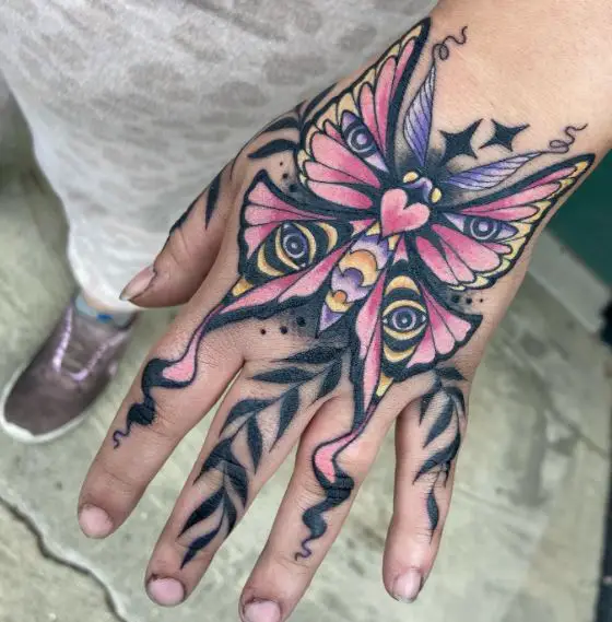 Colorful Eyed Moth Hand Tattoo