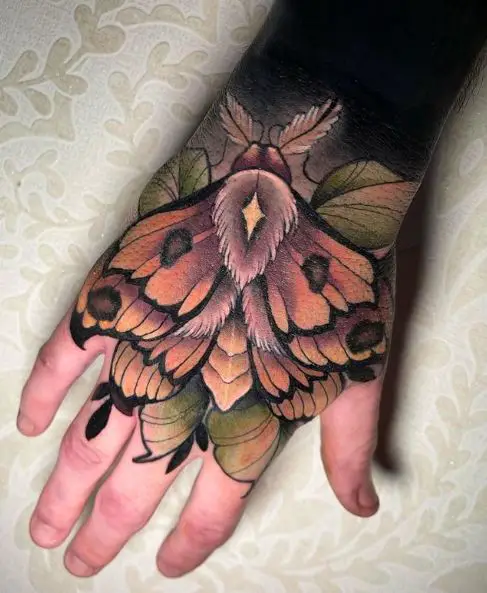 Orange Moth Hand Tattoo