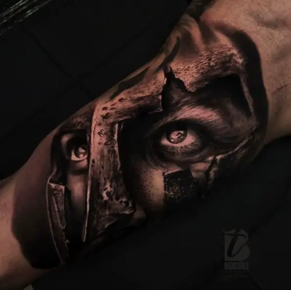 Spartan tattoo on the left upper arm, inspired by 300.