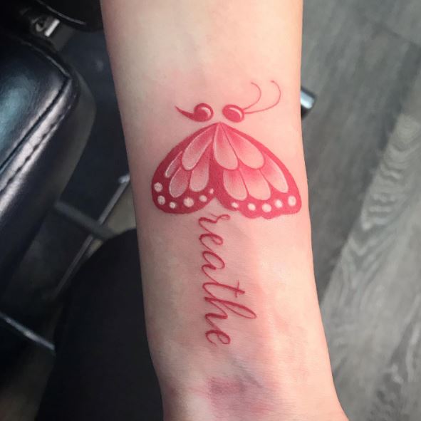 Red Butterfly Wrist Tattoo with Message