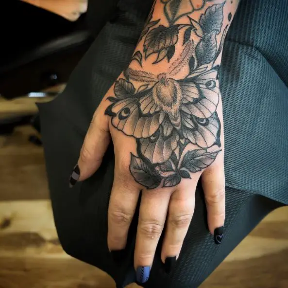 Branch with Leaves Moth Hand Tattoo