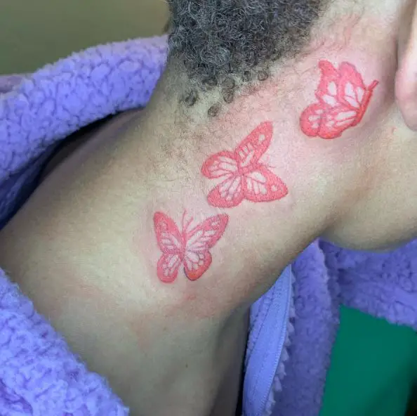 Three Red Monarch Butterflies Neck Tattoo