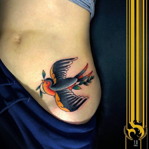 Black and Orange Swallow with Olive Branch Tattoo