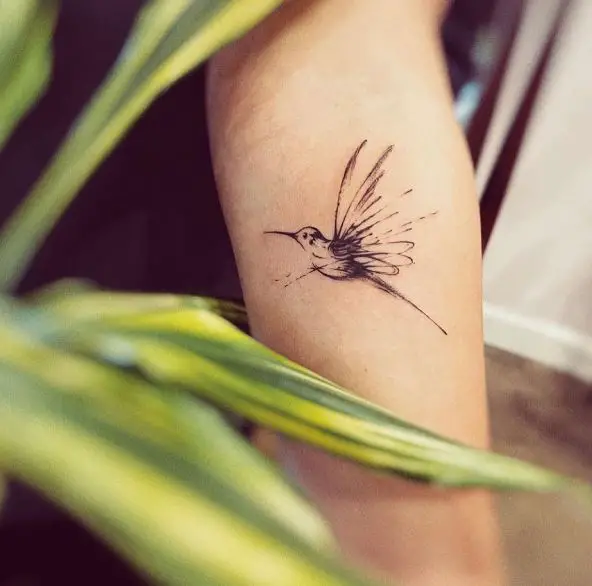 Abstract Hummingbird Tattoo on Elbow