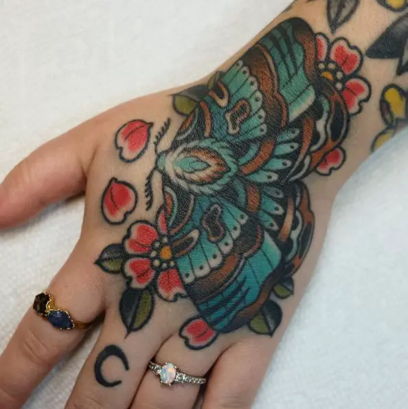 Colorful Flowers and Moth Hand Tattoo