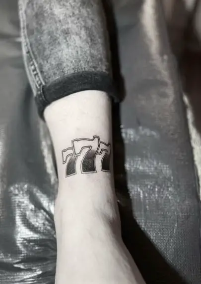 Black and White 777 Ankle Tattoo