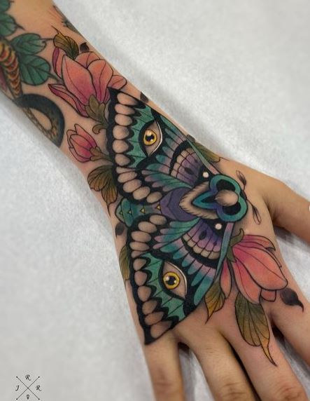 Colorful Flowers and Eyed Moth Hand Tattoo