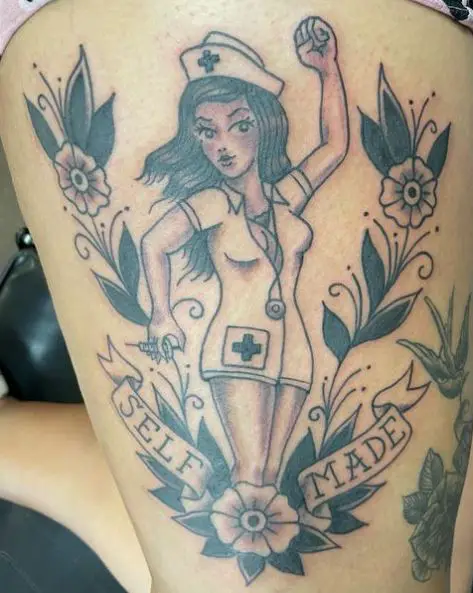 Nurse in White with Flowers Tattoo