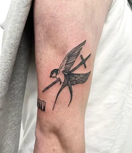 Sword Stabbed in Sparrow Arm Tattoo