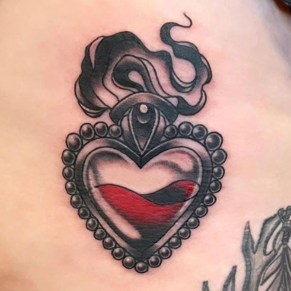 Black Pearls around Sacred Heart Tattoo