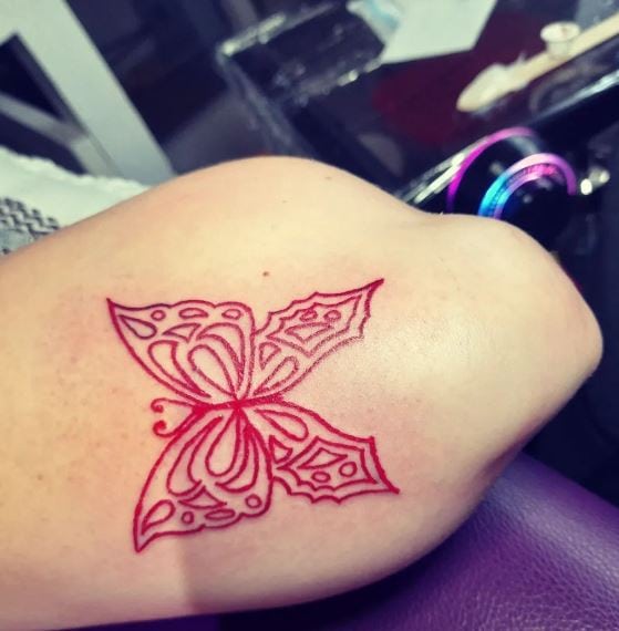 Red Tribal Butterfly Elbow Tattoo