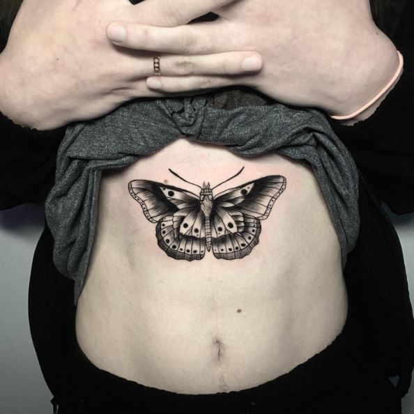 Black Moth Belly Tattoo