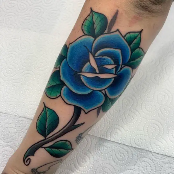 Blue Rose Green Leaves Forearm Tattoo