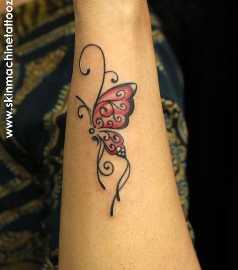 Artistic Red Butterfly Forearm Tattoo