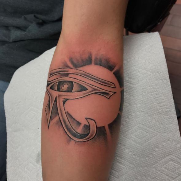 Sun in Background Eye of Horus Tattoo