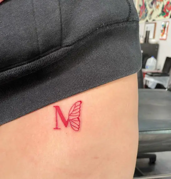 Half Letter M and Half Red Butterfly Tattoo