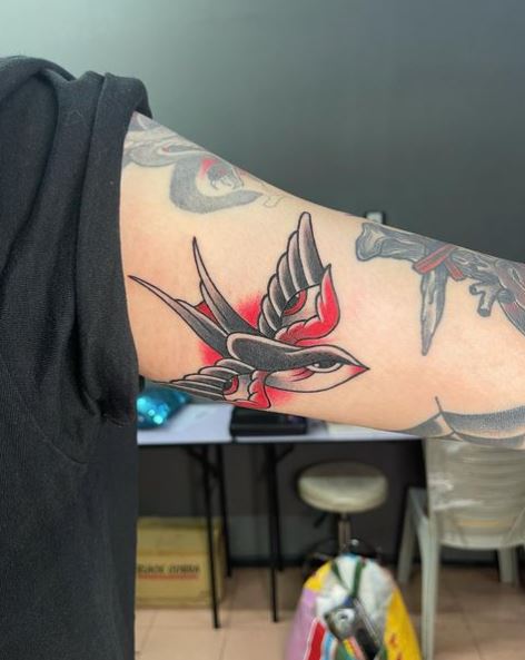 Black and Red Flying Biceps Tattoo