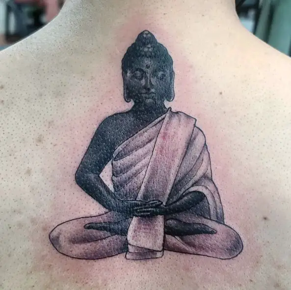 Black Meditating Buddha Upper Back Tattoo