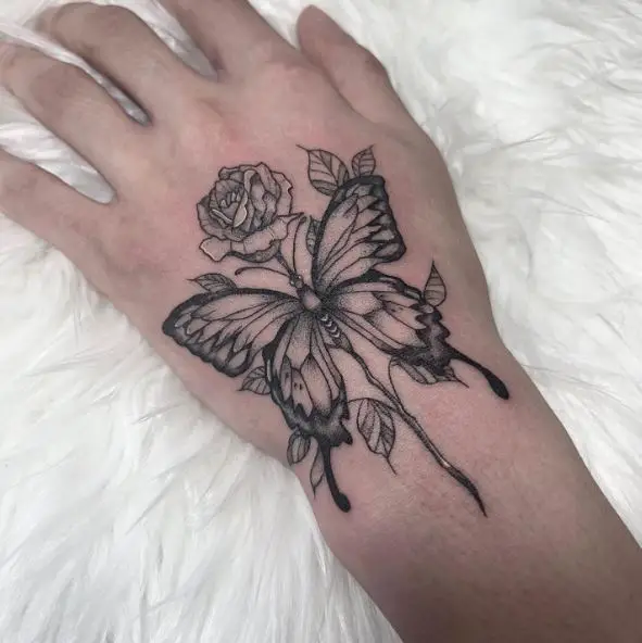 Shaded Rose and Butterfly Hand Tattoo
