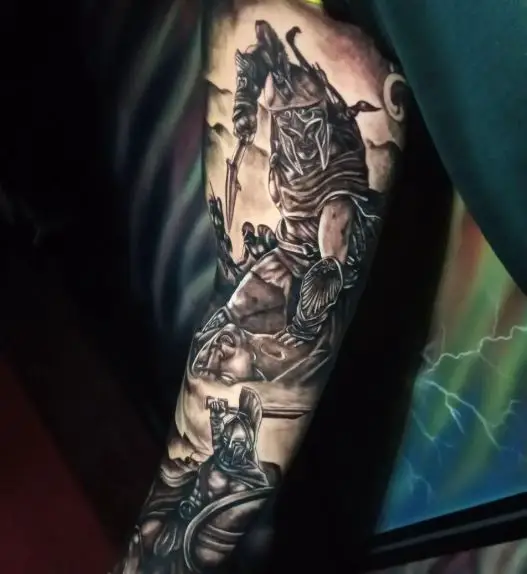 Spartan Warrior Killing Enemy with Spear Arm Tattoo