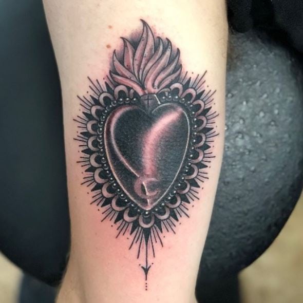 Glowing Black Sacred Heart Arm Tattoo