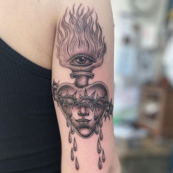 Woman Face on Bleeding Sacred Heart Arm Tattoo