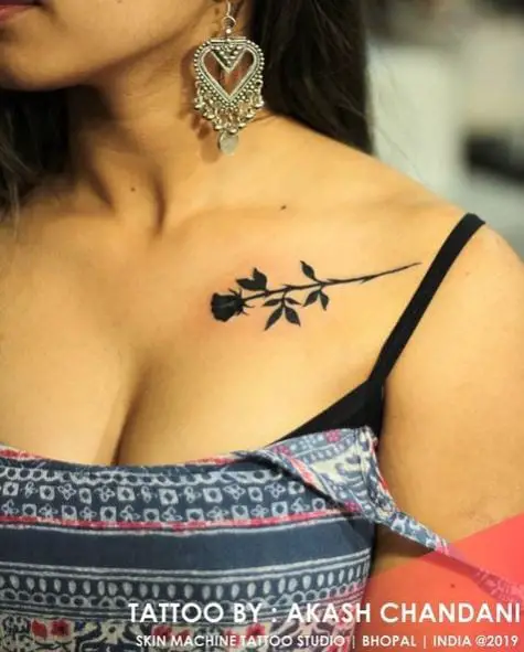 Small Black Rose Shoulder Tattoo