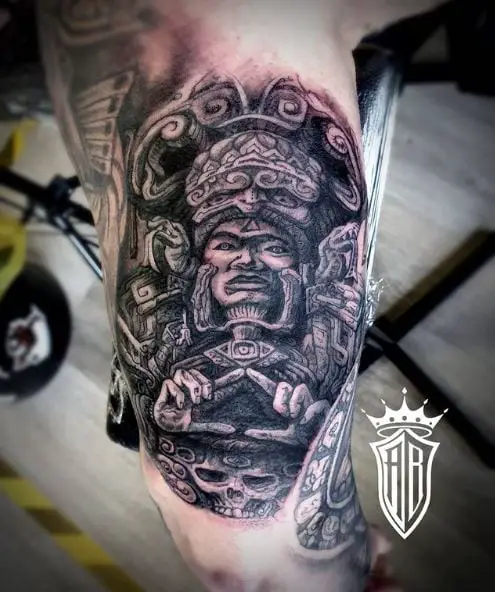 Black and Grey Mayan Carvings Back Arm Tattoo