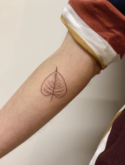 Minimalistic Bodhi Leaf Forearm Tattoo