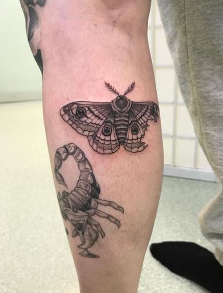 Scorpion and Ripped Moth Leg Tattoo