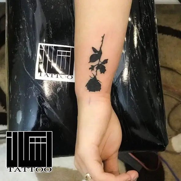 Small Black Rose Wrist Tattoo