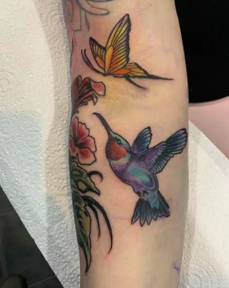 Hummingbird and Butterfly Tattoo on Elbow
