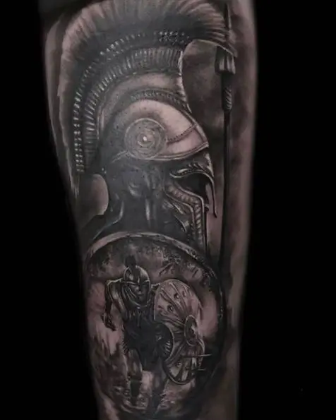 Dark Grey Spartan Battle Scene Arm Tattoo